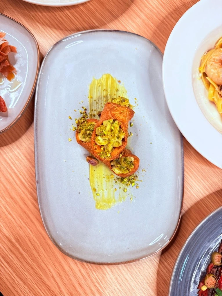 Chilean Seabass with Pea Risotto at La Torino Trattoria fine dining Calgary